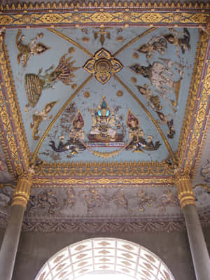 Majestic Ceiling Artistry Of Pataxui War Monument In Laos Wallpaper