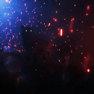 Majestic Cheetah Staring With Glowing Eyes Wallpaper