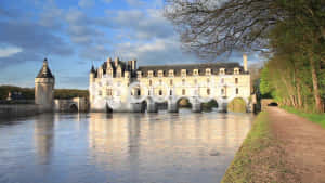 Majestic Chenonceau Castle At Twilight Wallpaper