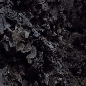 Majestic Dark Rock Formation Wallpaper