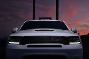 Majestic Dodge Durango Gliding Smoothly On Highway Wallpaper