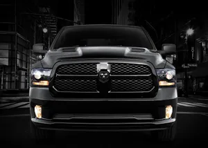 Majestic Dodge Ram Dominating The Off-road Terrain Wallpaper