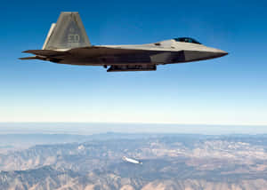 Majestic F-22 Raptor Soars Over The United States Wallpaper