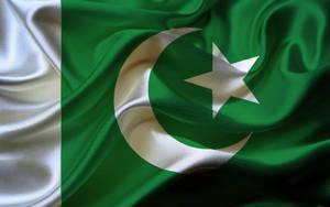 Majestic Folds On The Vibrant Pakistan Flag Wallpaper