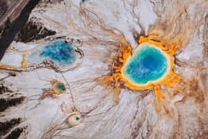 Majestic Geyser Eruption In Yellowstone National Park Wallpaper