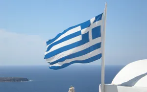 Majestic Greek Flag Soaring High Wallpaper
