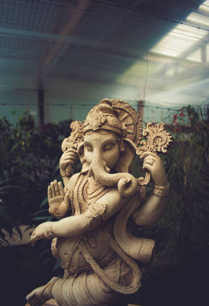 Majestic Hd Image Of Cement Ganesha Statue Wallpaper