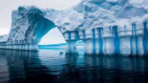 Majestic Iceberg On A Clear Day Wallpaper