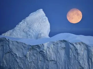 Majestic Iceberg On Pristine Waters Wallpaper