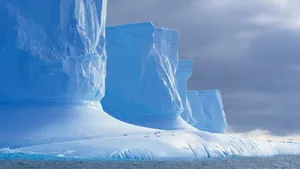 Majestic Iceberg On The Open Sea Wallpaper