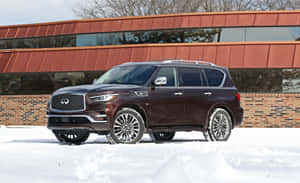 Majestic Infiniti Qx80 In Pristine Landscape Wallpaper