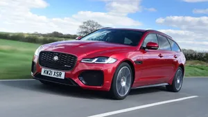 Majestic Jaguar Xf In Full Throttle Wallpaper