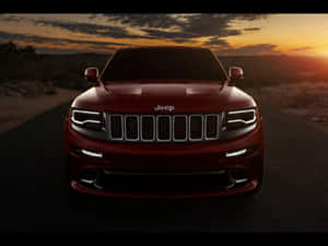 Majestic Jeep Grand Cherokee Roaming In The Wilderness Wallpaper