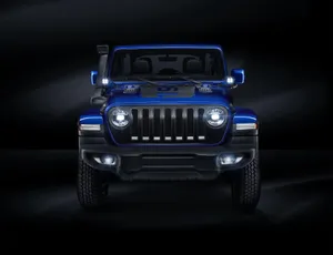 Majestic Jeep Liberty Conquering Rugged Terrain Wallpaper