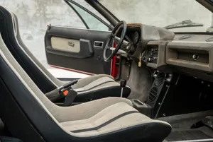 Majestic Lamborghini Silhouette Against A Vibrant Sunset Wallpaper