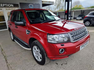 Majestic Land Rover Freelander Conquering An Off-road Trail Wallpaper