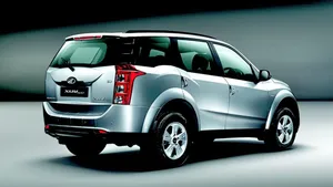 Majestic Mahindra Xuv500 Amidst The Cityscape Wallpaper