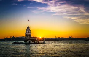 Majestic Maiden Tower At Sunset Wallpaper