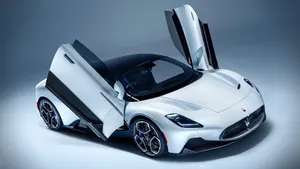 Majestic Maserati Mc20 Supersports Car - Beauty In Motion Wallpaper