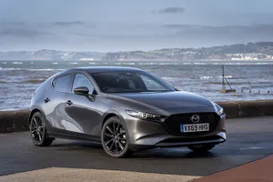 Majestic Mazda 3 Hatchback In Full Glory Wallpaper