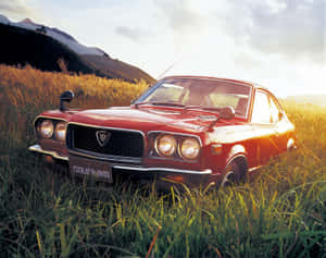 Majestic Mazda Rx-3 In Action Wallpaper