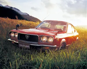 Majestic Mazda Rx-3 In Action Wallpaper