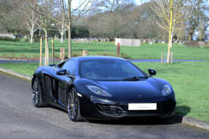 Majestic Mclaren Mp4-12c In Full Speed Wallpaper