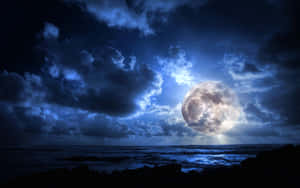 Majestic_ Moonrise_ Over_ Ocean Wallpaper