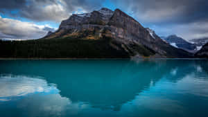 Majestic_ Mountain_ Lake_at_ Dusk_4 K Wallpaper