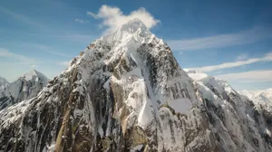 Majestic_ Mountain_ Peak_ Snow_ Covered Wallpaper