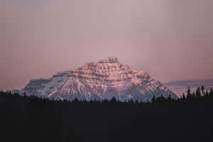 Majestic Mountain Peakat Dusk Wallpaper