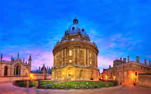 Majestic Night View Of Radcliffe Camera, Oxford University Wallpaper