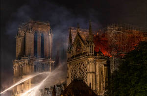 Majestic Notre-dame Cathedral Ablaze Wallpaper