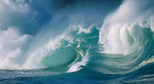 Majestic Ocean Tides At Sunset Wallpaper