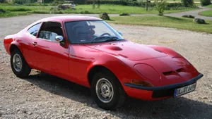 Majestic Opel Gt Gliding On The Road Wallpaper