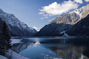 Majestic Panorama Of Glarus Mountain Range Wallpaper