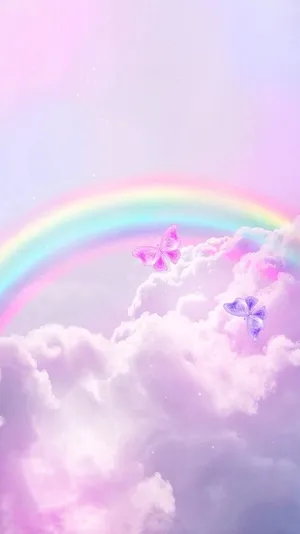 Majestic Rainbow Amidst The Clouds Wallpaper