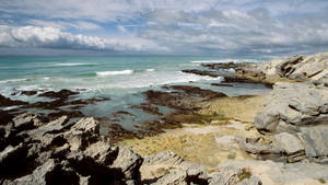 Majestic Rocky Seaside In South Africa Wallpaper