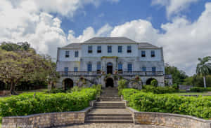 Majestic Rose Hall Great House Under The Clear Blue Sky Wallpaper