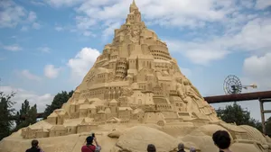 Majestic Sandcastle On A Sunny Beach Day Wallpaper