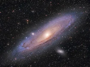 Majestic Spiral Galaxy In Deep Space Wallpaper