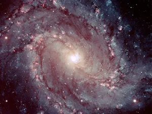 Majestic Spiral Galaxy In The Depths Of The Universe Wallpaper