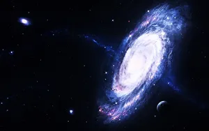 Majestic Spiral Galaxy In The Vast Universe Wallpaper