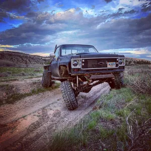 Majestic Square Body Truck Against A Mountainous Landscape Wallpaper