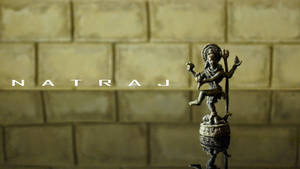 Majestic Stone Figurine Of Nataraja Wallpaper