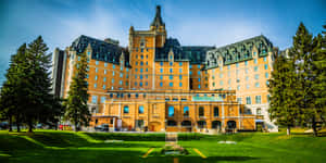 Majestic Sunset Over The Saskatchewan River In Saskatoon Wallpaper