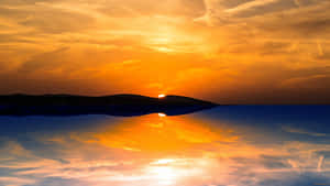 Majestic Sunset Reflection On Serene Waters Wallpaper