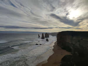 Majestic Twelve Apostles On A Gloomy Day In Victoria, Australia Wallpaper