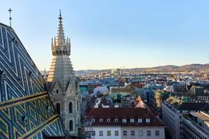 Majestic Vienna Cathedral Under A Blue Sky Wallpaper