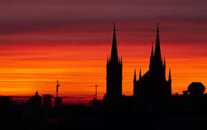 Majestic Vienna Cathedral Under The Blue Sky Wallpaper